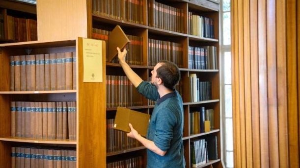 Frances A. Yates Long-Term Fellowships. Man in Library.